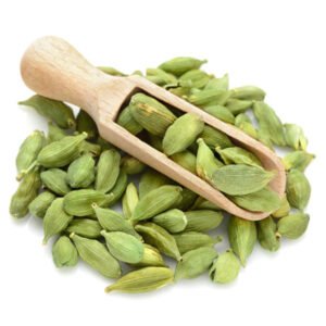 Cardamom overflowing from a scoop